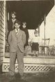 Loy, Ella, Bertha, Robert Beals on front porch.jpg